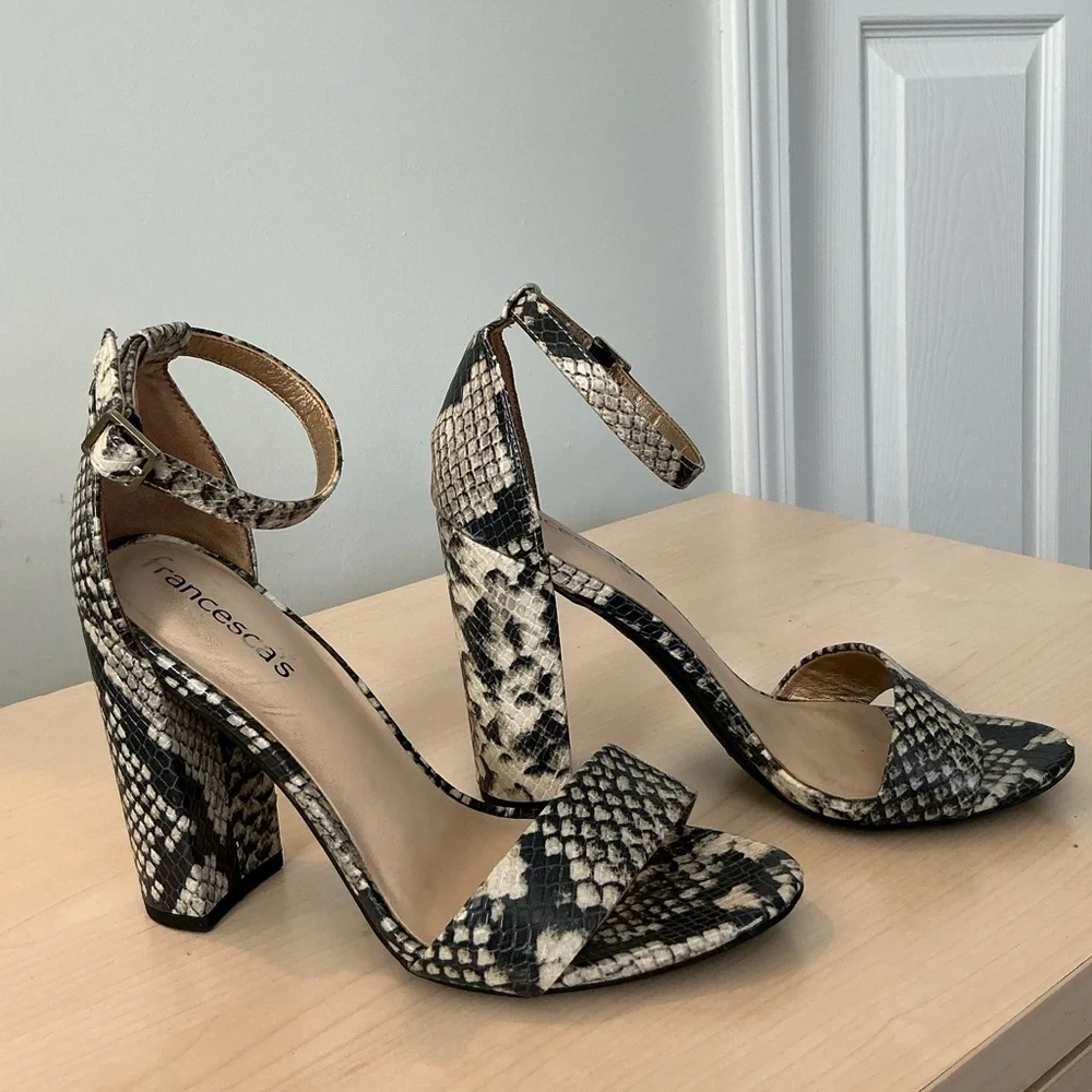 Francesca’s snake print embossed ankle strap heels